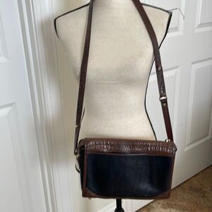 Beautiful brown and black cross body Brahmin bag.  Perfect size!